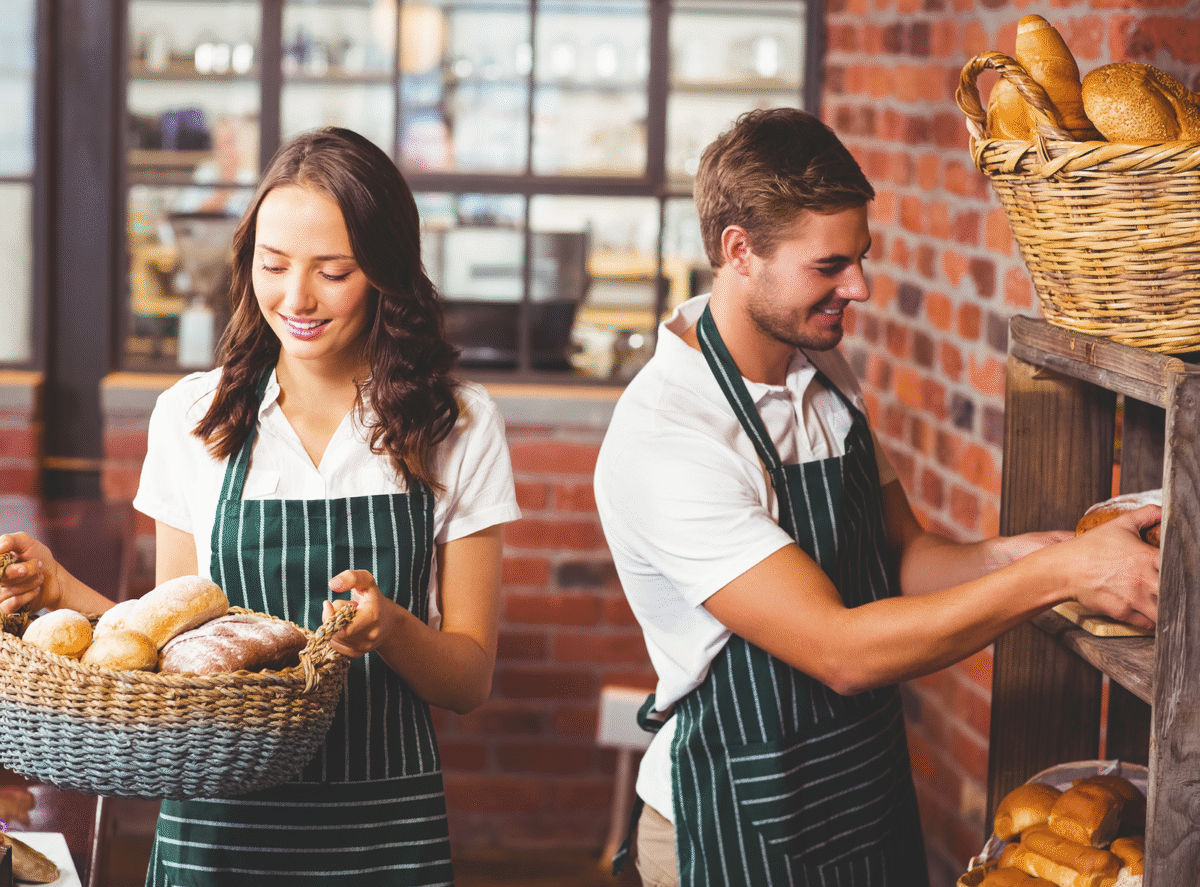 Happy workers working with a smile. Creative Commons Attribution-Share Alike 4.0 International license.
